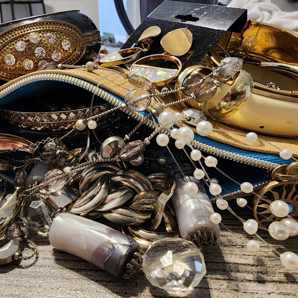 Silver And Gold Toned Jewlery In A Cute Little Clutch